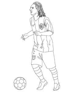 דף צביעה ציור של שחקן כדורגל באמצע משחק לצביעה